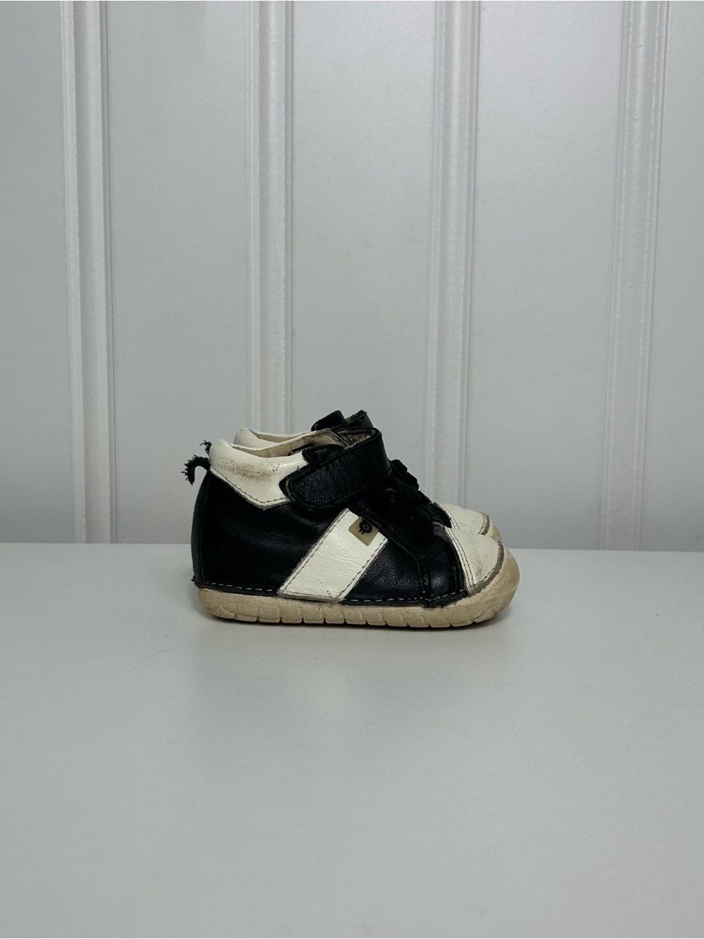 Old soles black white baby crib shoes little feet that walk the earth size 3